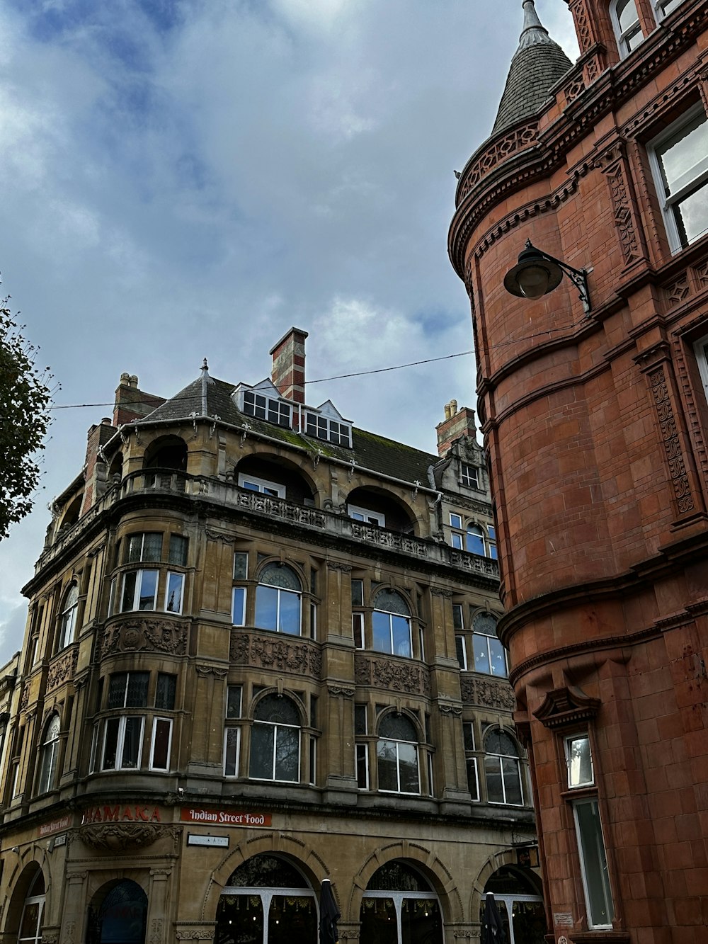 a tall building with a clock on the front of it