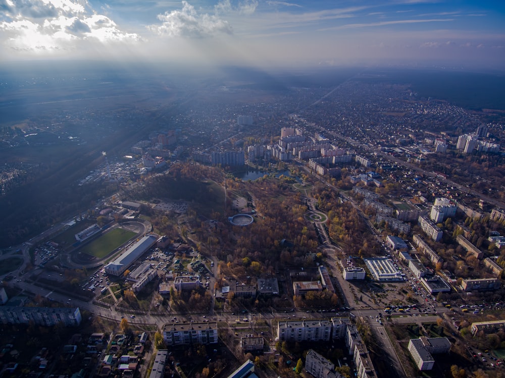 an aerial view of a city with lots of trees