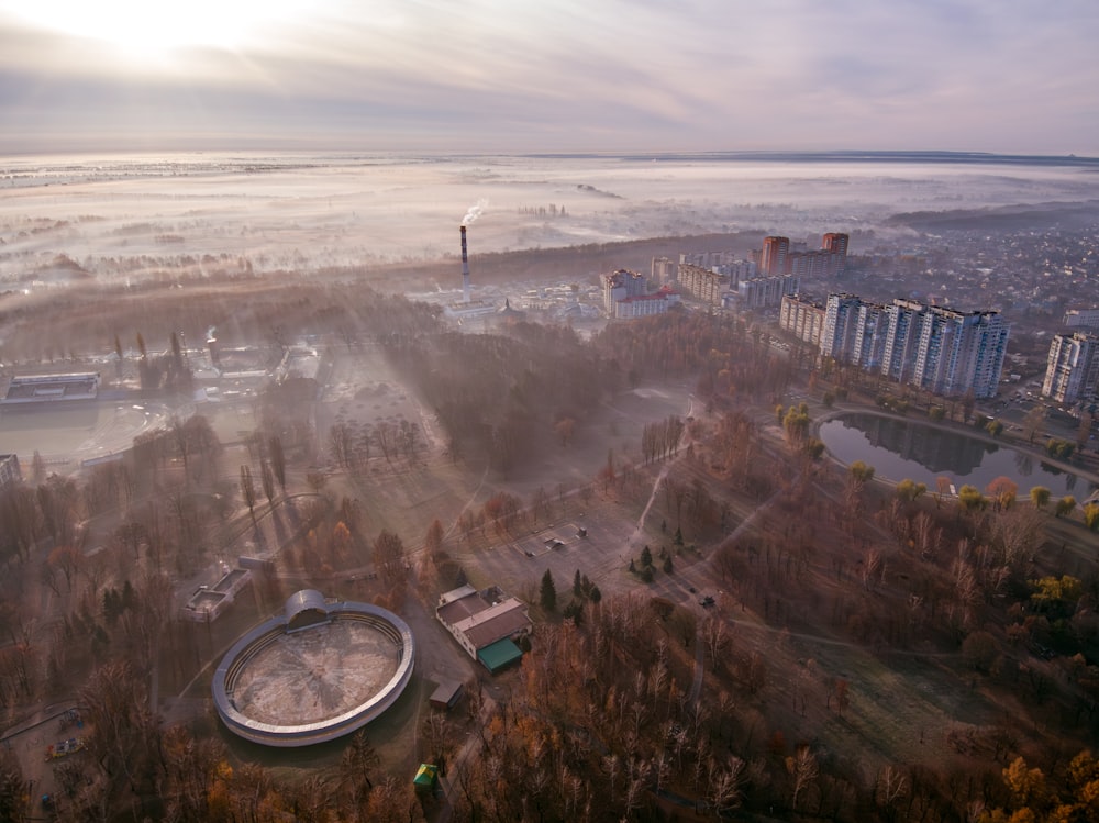 an aerial view of a city and a lake