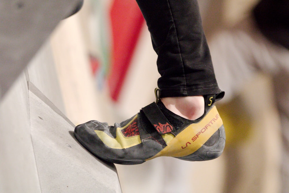 a close up of a person's feet on a skateboard