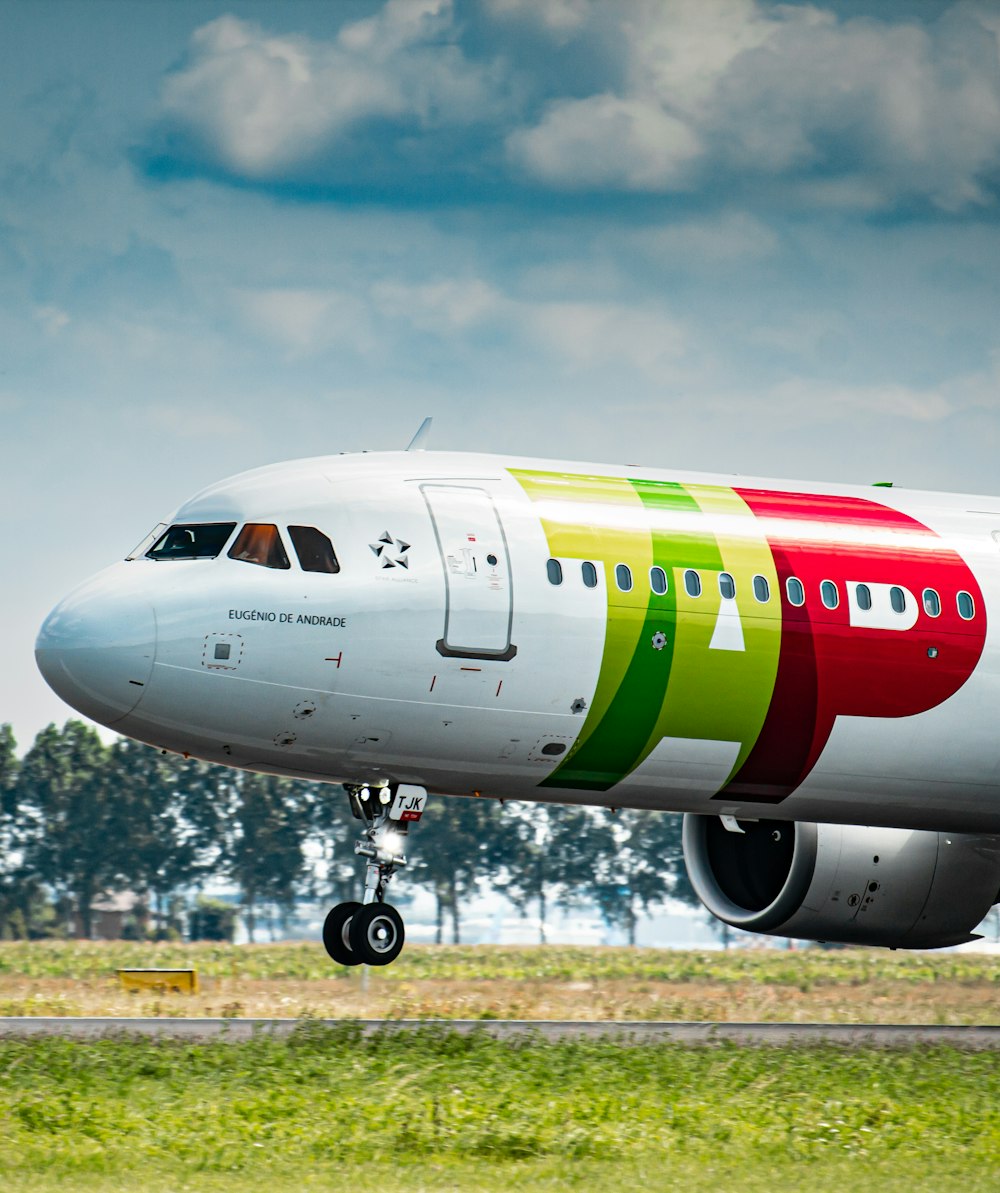 a large jetliner taking off from an airport runway