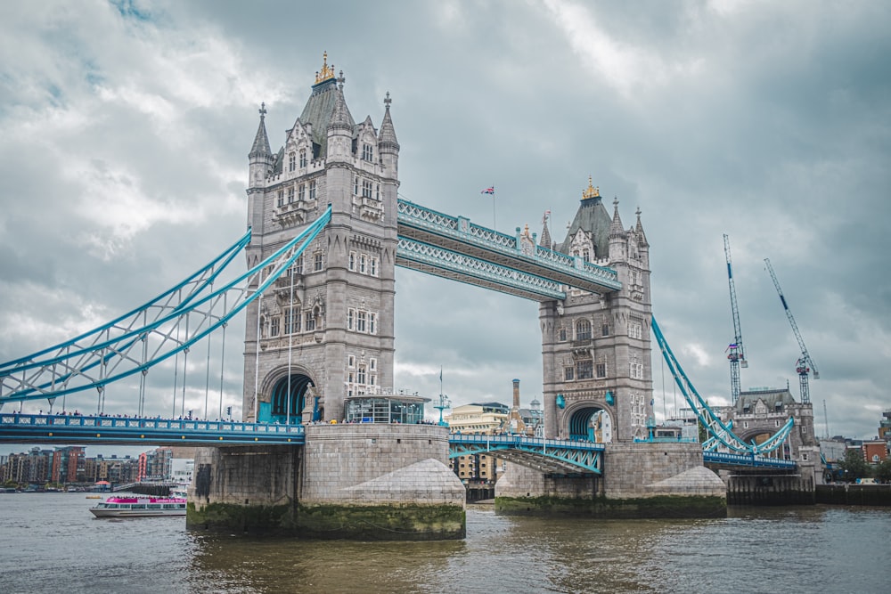 a view of the tower bridge from the water