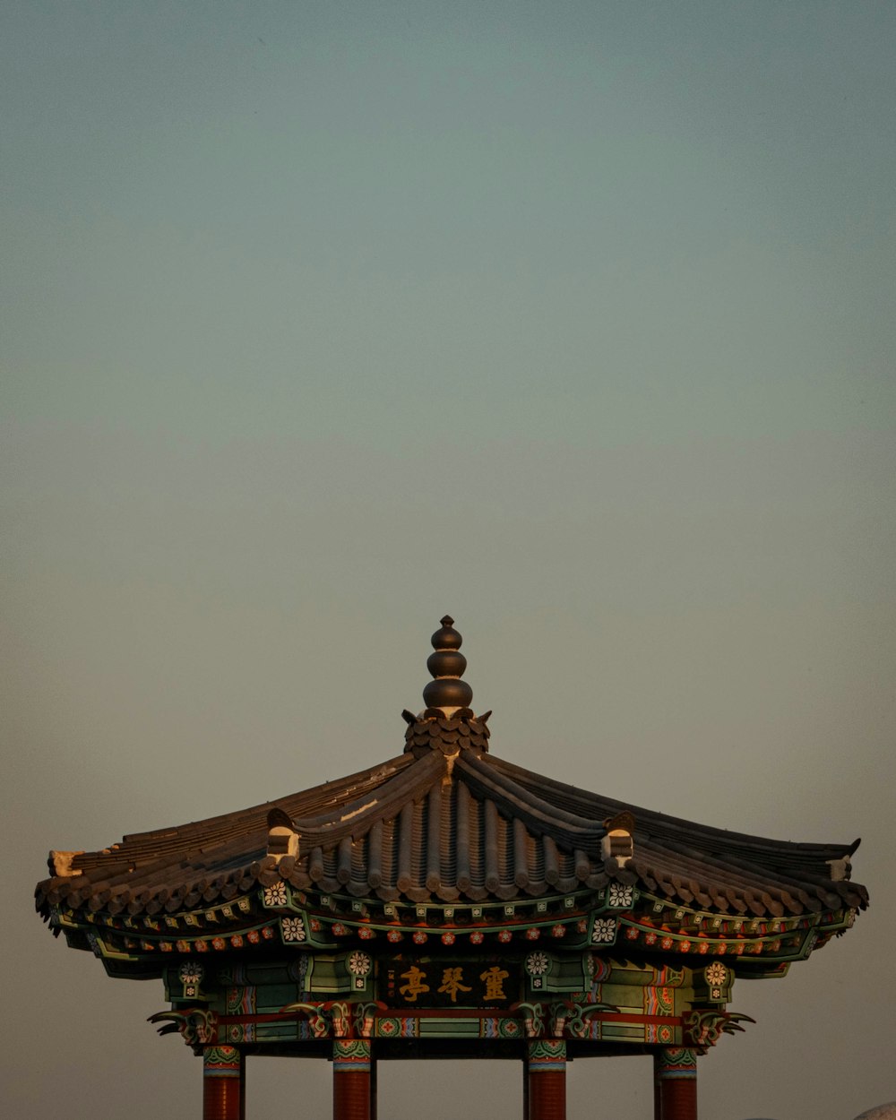 a tall tower with a clock on top of it