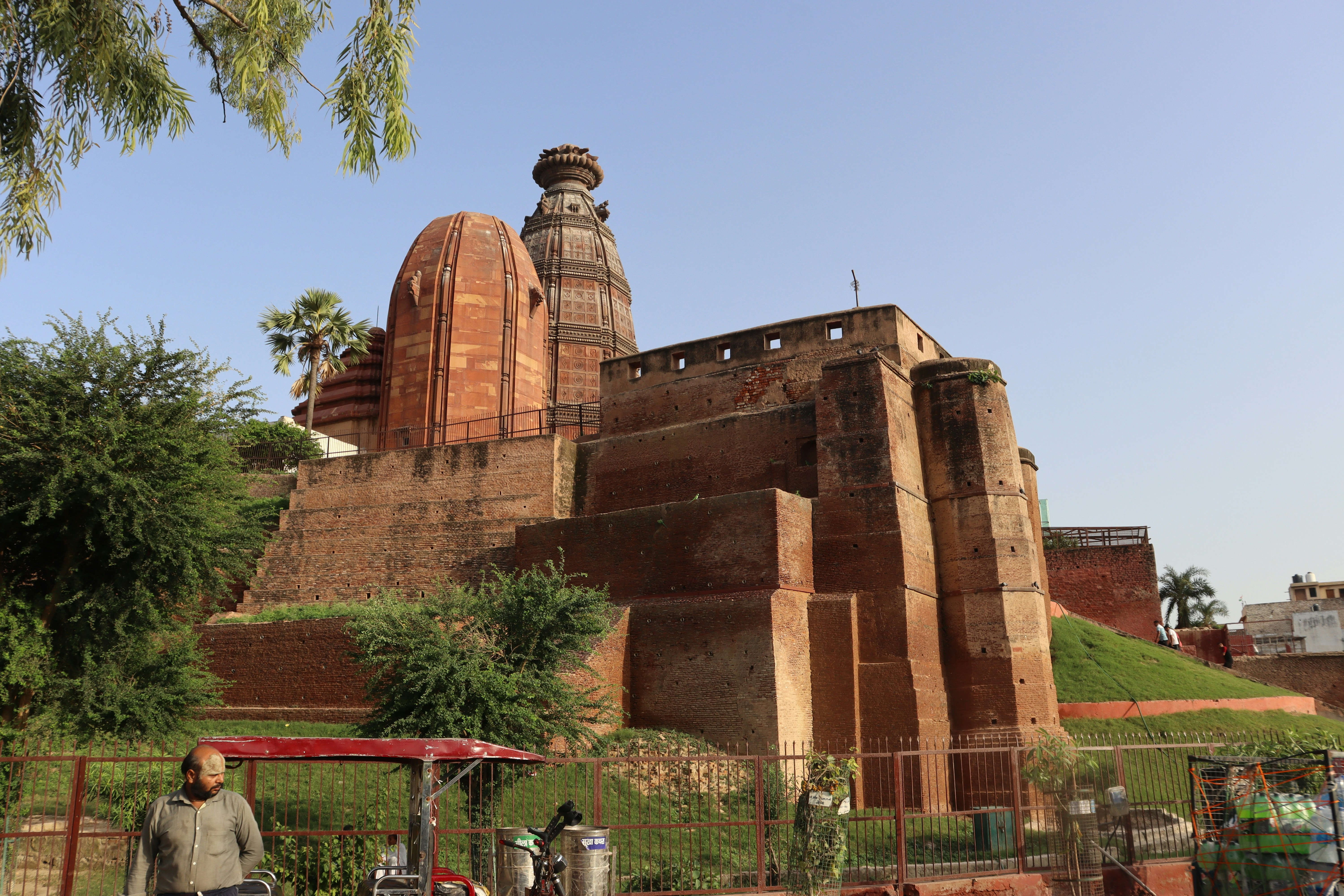 Radha Madan Mohan Temple in the holy city of Vrindavan Madan Mohan Temple, Vrindavan Located near the Kali Ghat in Vrindavan, Madan Mohan Temple dedicated to Sri Krishna is believed to be the oldest existing temple in Vrindavan that stands 18.288 metres tall. Built in the year 1580, this shrine is located within fortified walls on a hillock. Despite being in ruins, this temple offers a certain sense of charm and every pilgrim wish to visit here. Madan Mohan Temple is artistically carved, oval in shape and is built with red stone at Aditya Tila.