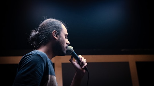 a man with a microphone in his hand