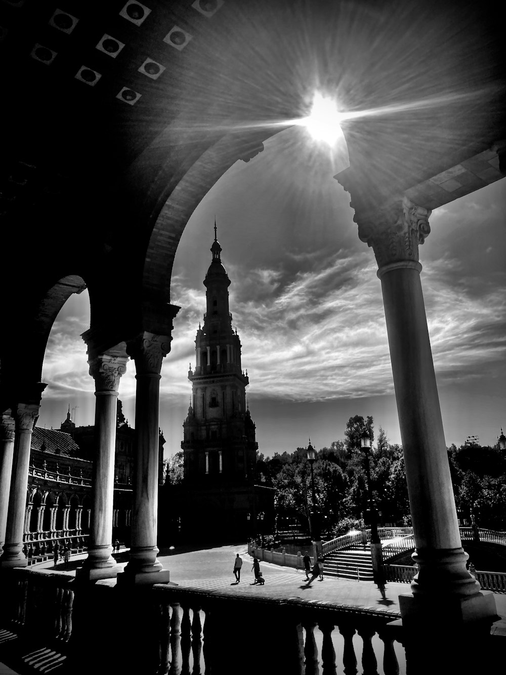 a black and white photo of a clock tower