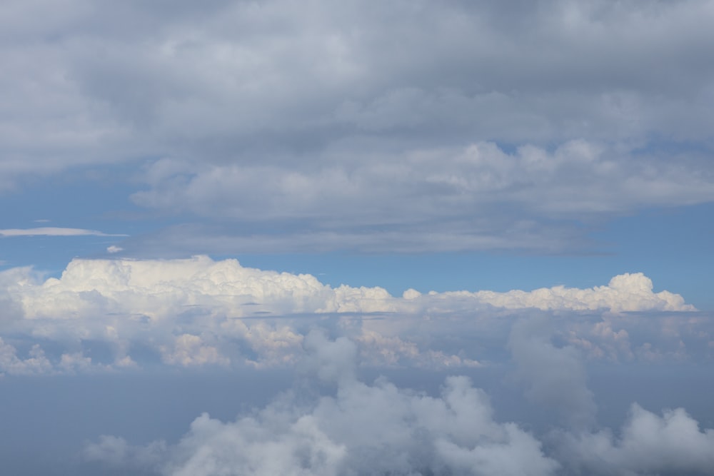 a view of clouds from an airplane window