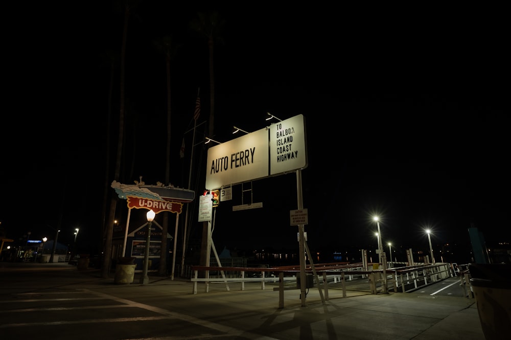 a street sign sitting on the side of a road