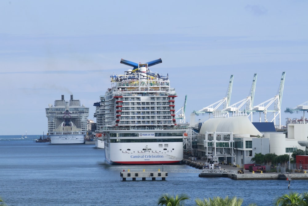 a large cruise ship docked in a harbor