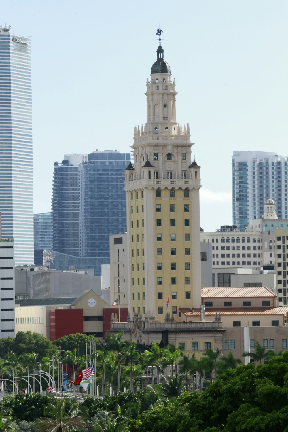 a tall clock tower towering over a city