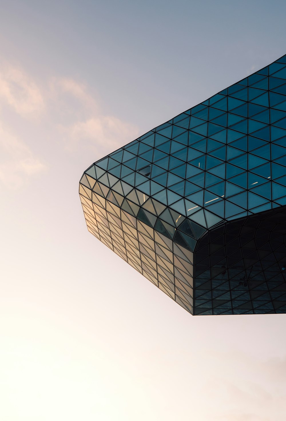 a very tall building with a sky in the background