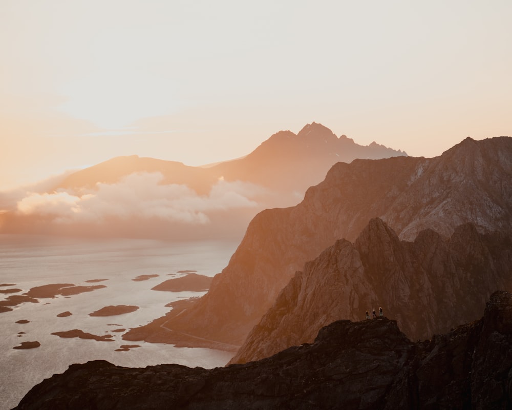 a mountain with a body of water in the middle of it