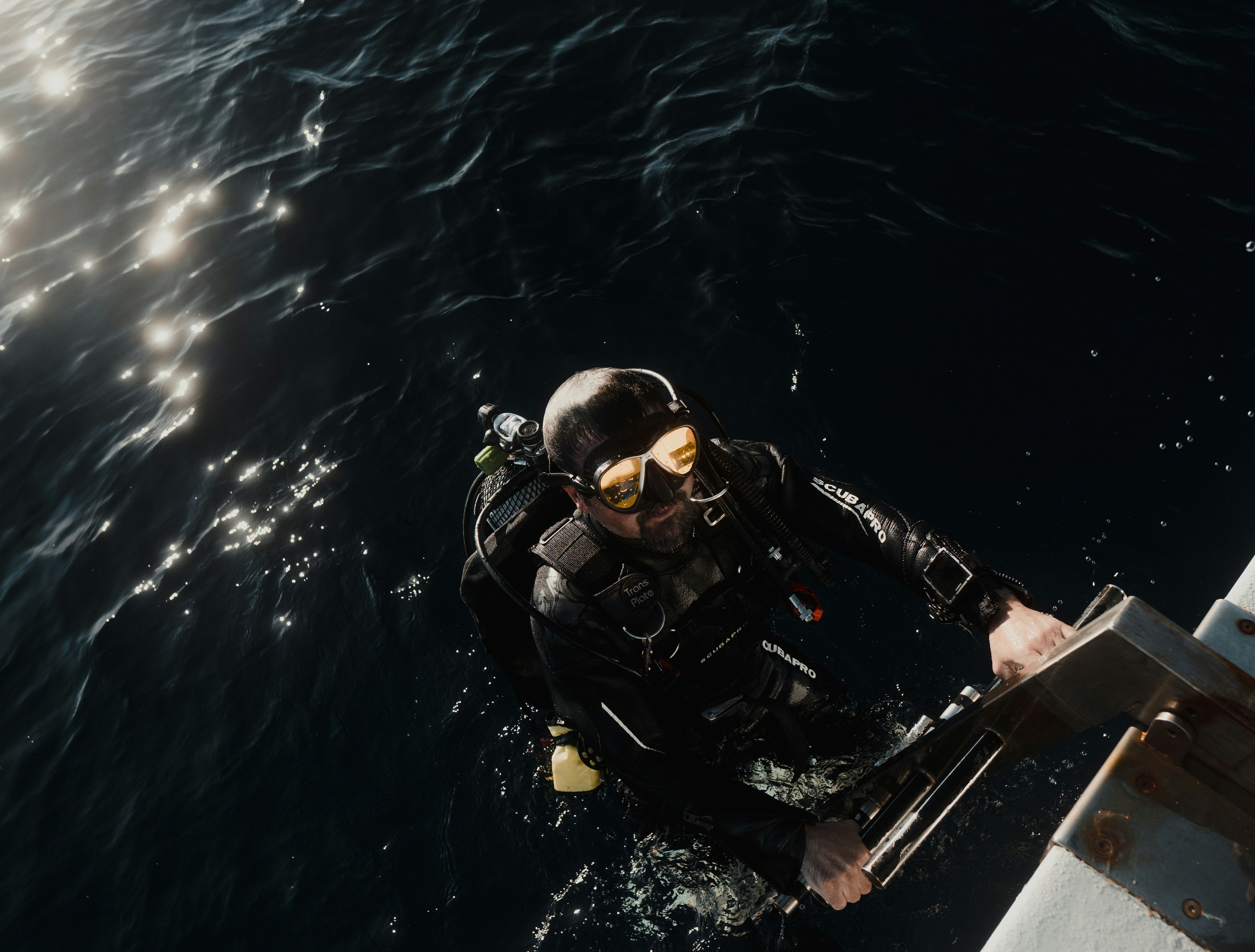 a man in a diving suit is in the water