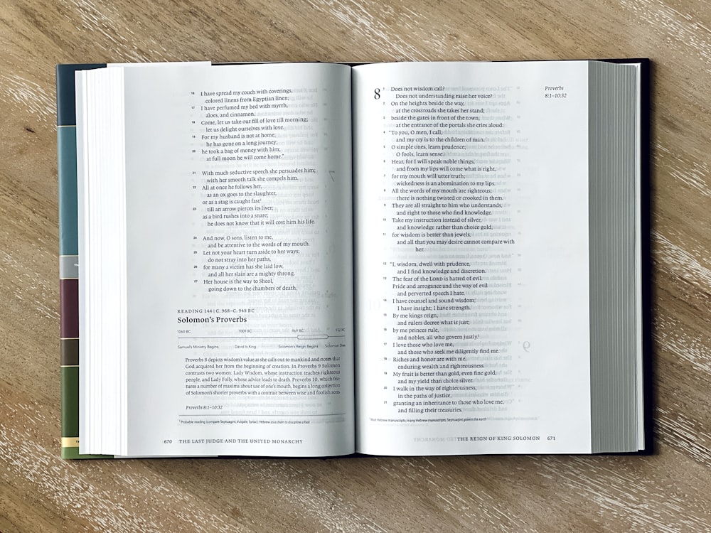 an open book on a wooden table