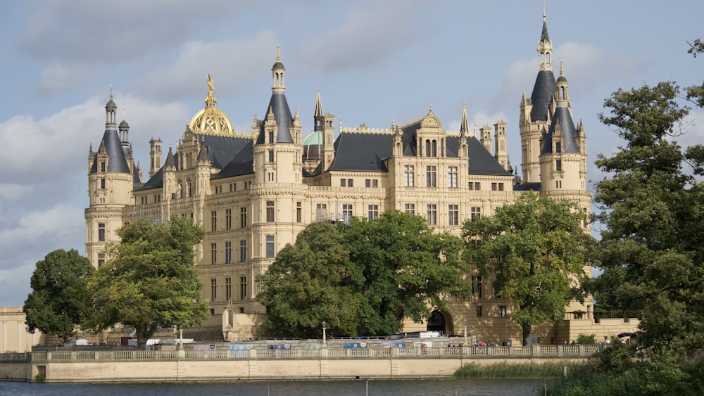 a large castle like building with a clock tower