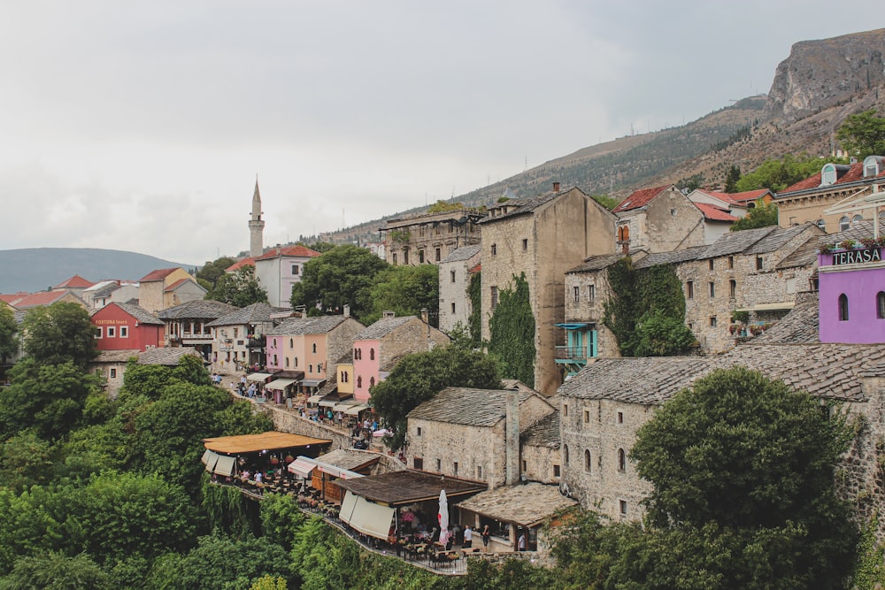 a village with a mountain in the background