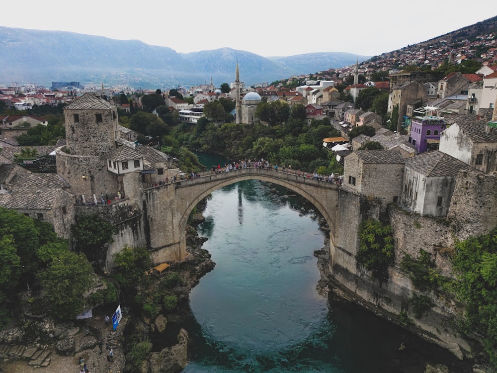 a bridge over a river in a city