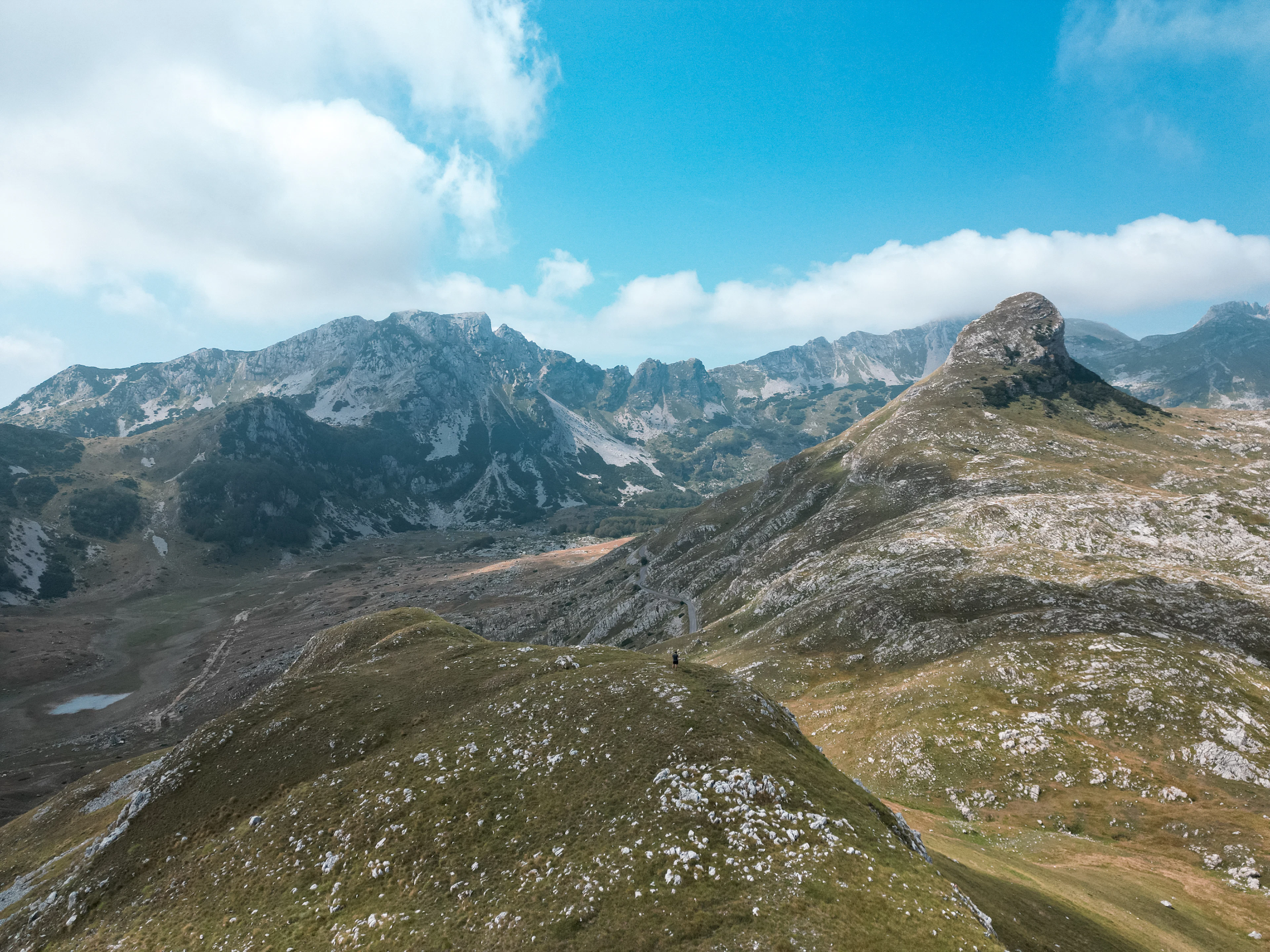 The limestone peaks and green high pastures of the Durmitor massif in summer