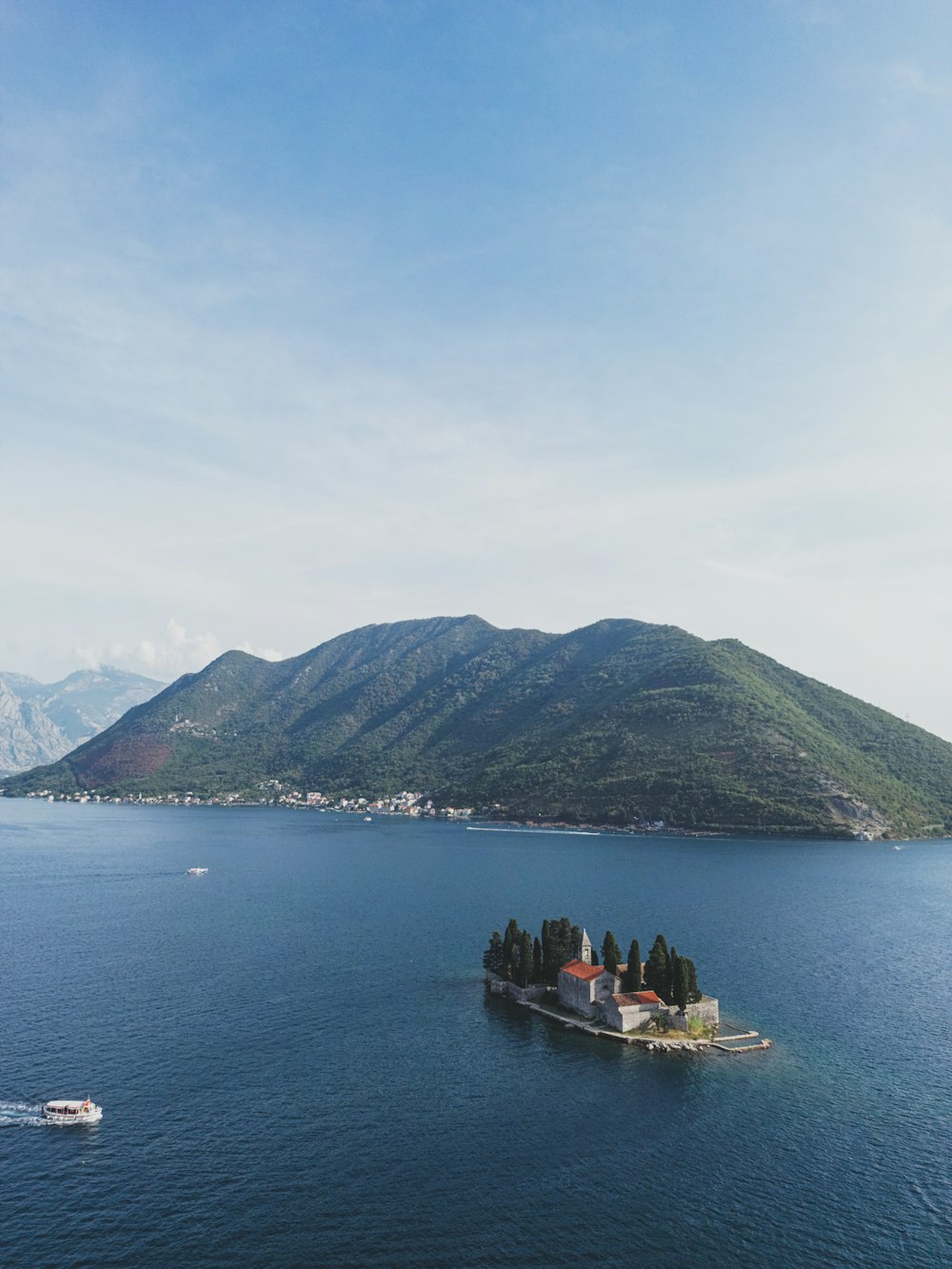 a small island in the middle of a large body of water