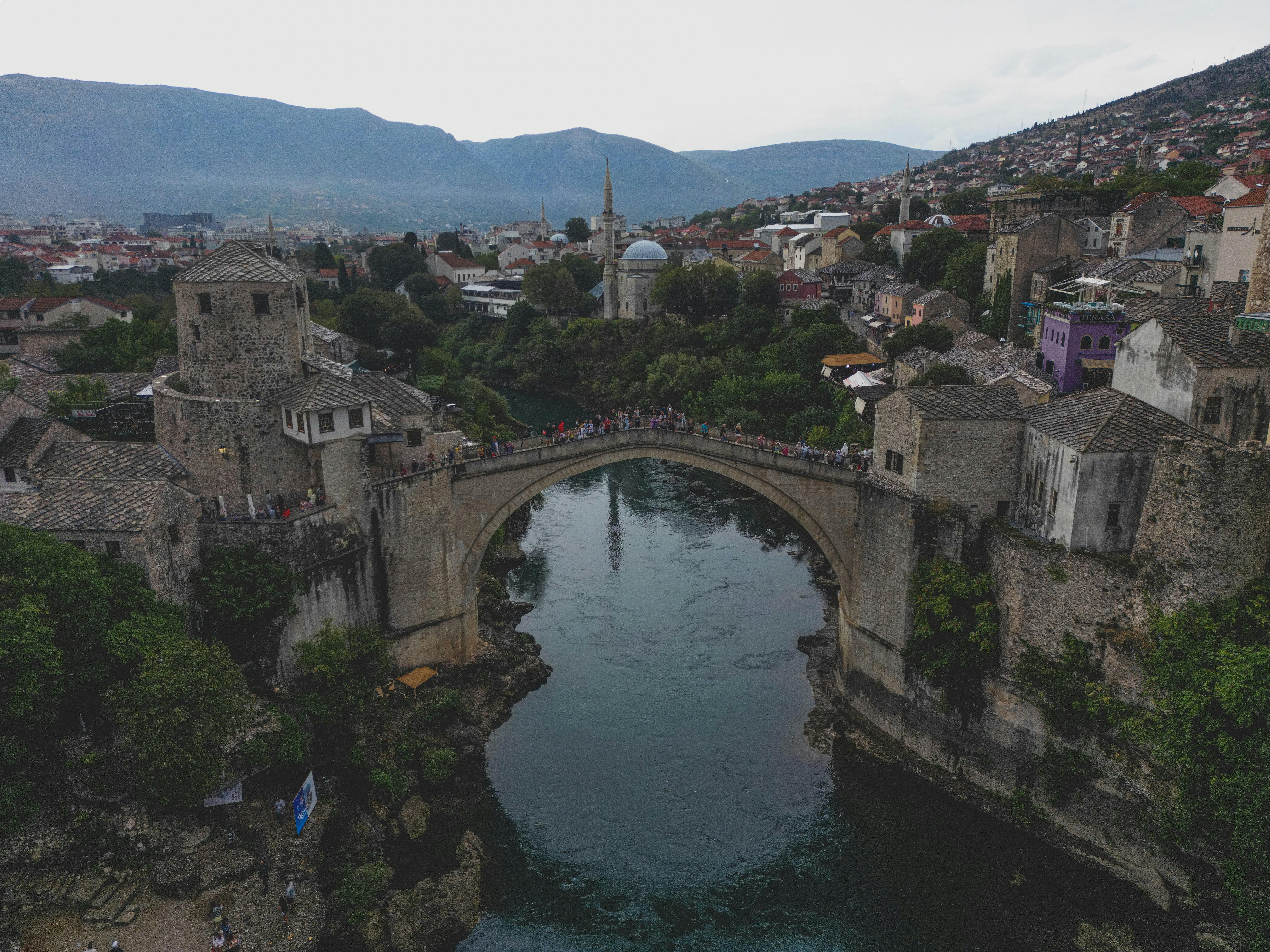 a bridge over a river in a city