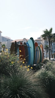 A vibrant surf scene capturing colorful surfboards on the beach.