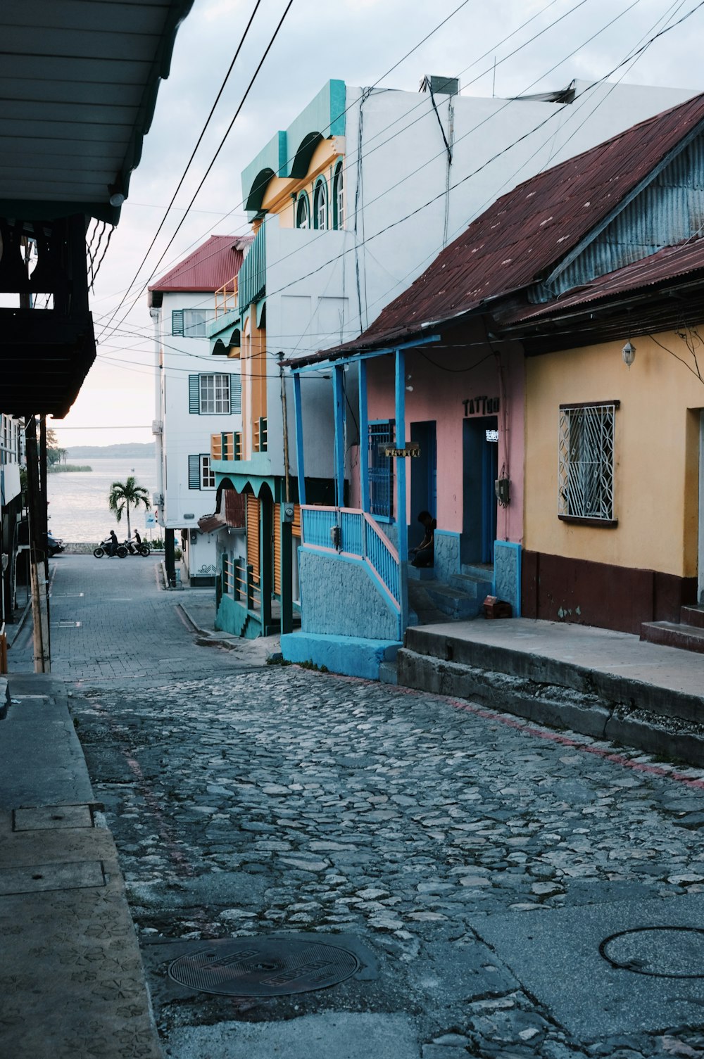 a cobblestone street in a small town