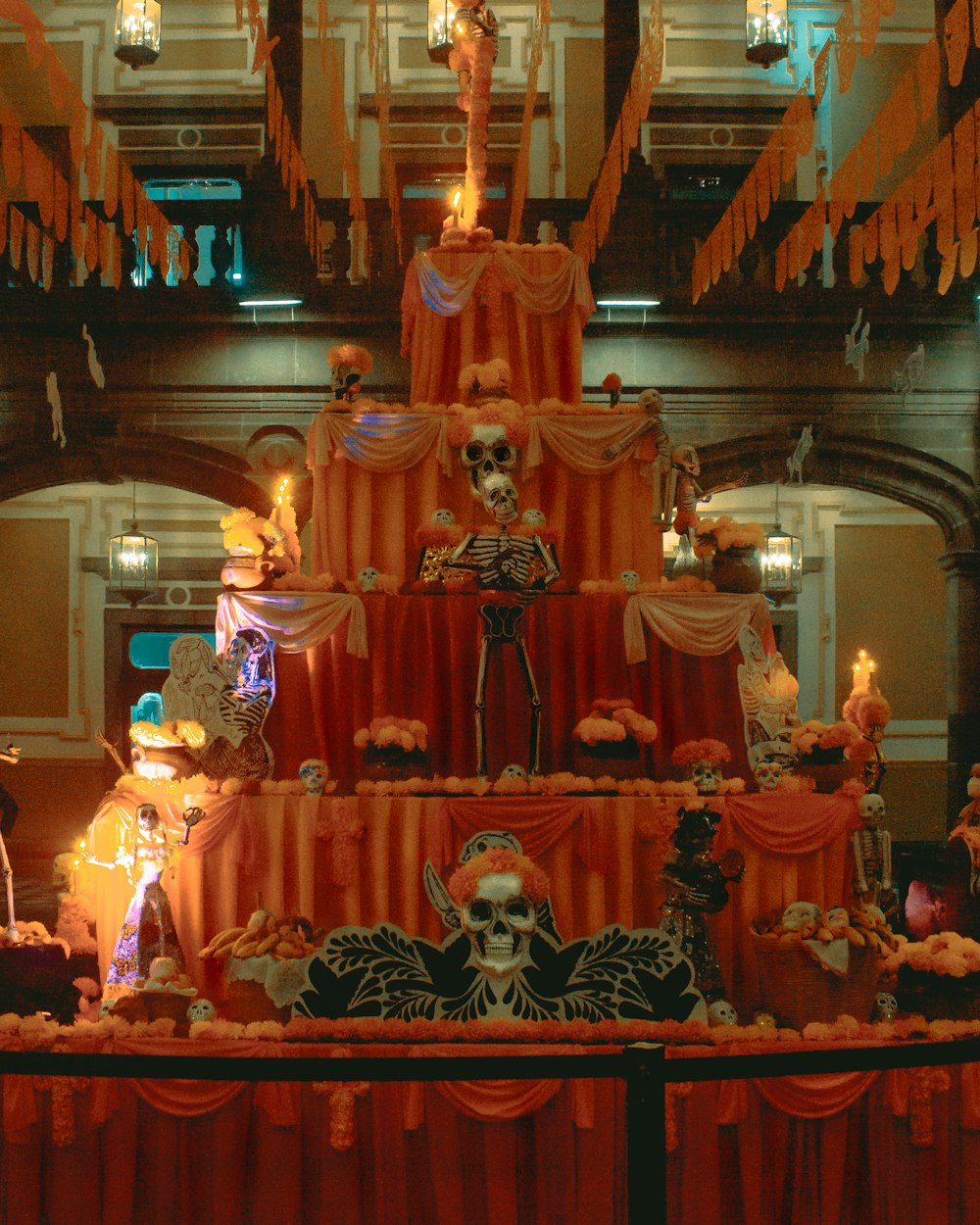 a large cake with a skeleton on top of it