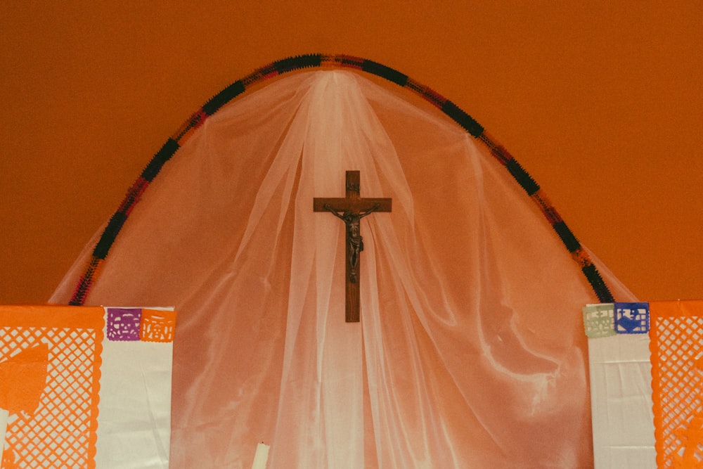 a cross on the wall of a church