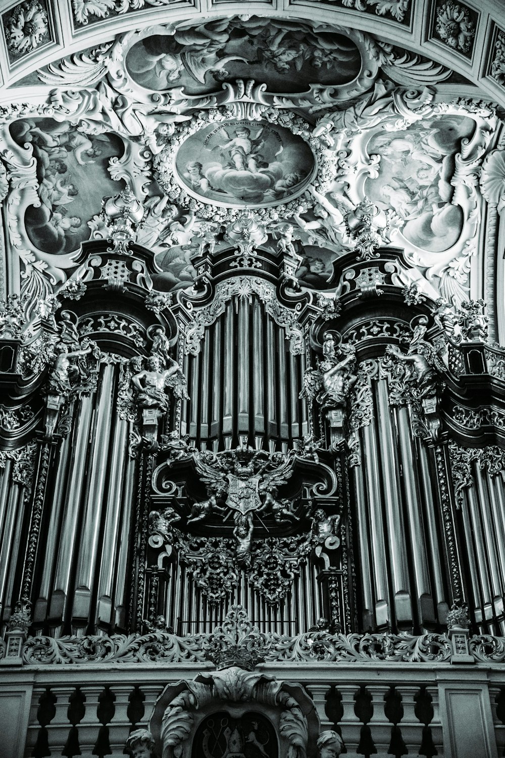 an ornate pipe organ in a church