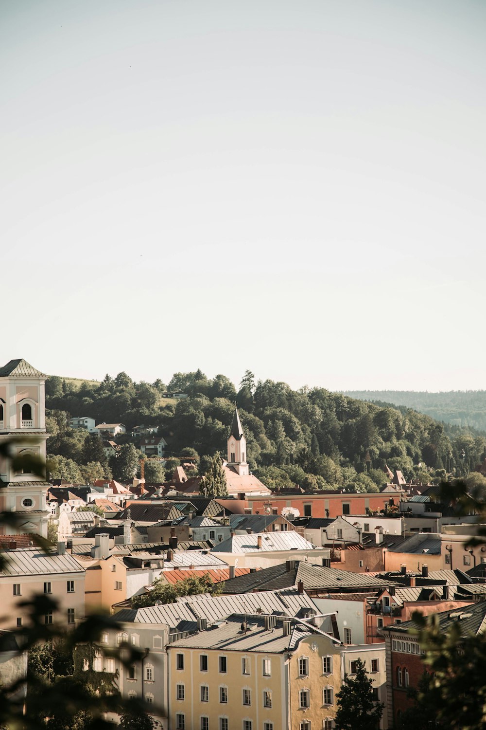 a view of a city from a hill