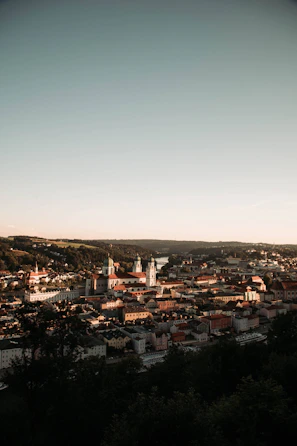A panoramic view of a historic European town with cobblestone streets.