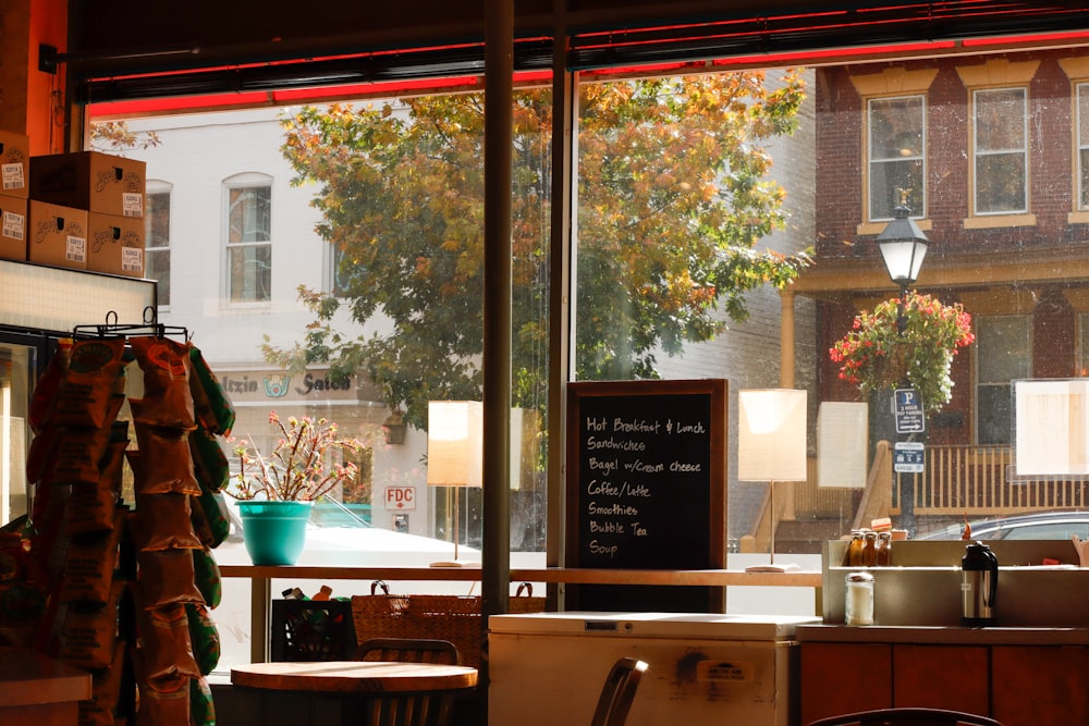 a kitchen with a sign on the window