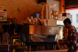 Inventory management system screen showing scheduled coffee restocking for a busy workplace.