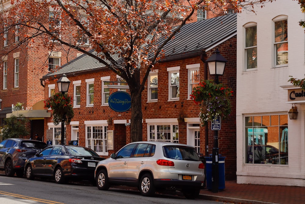 a row of parked cars on a city street