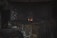A dimly lit blacksmith's forge with a small fire glowing on a brick hearth. An anvil and various tools hang nearby, creating a rustic and industrial atmosphere.