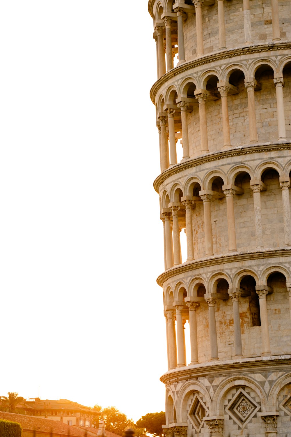 a very tall tower with a clock on it's side