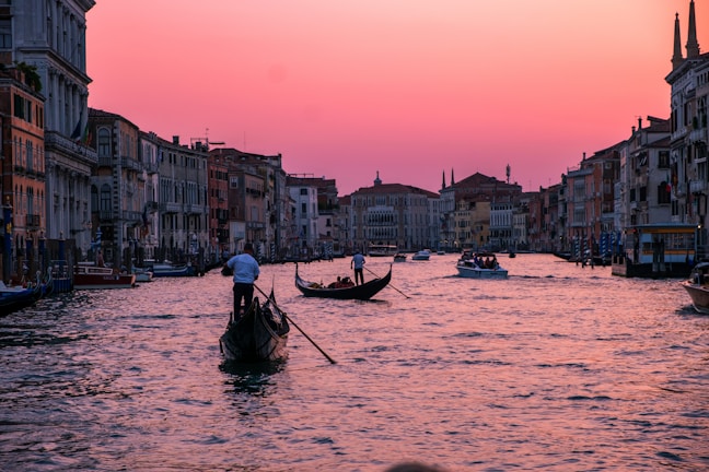 Sunset view over Xochimilco canals with trajineras gently gliding through the water