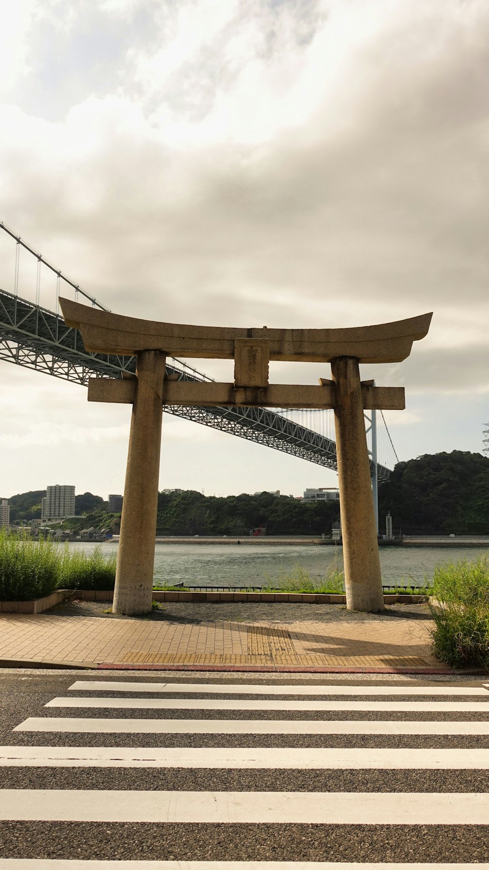 a large wooden structure sitting on the side of a road