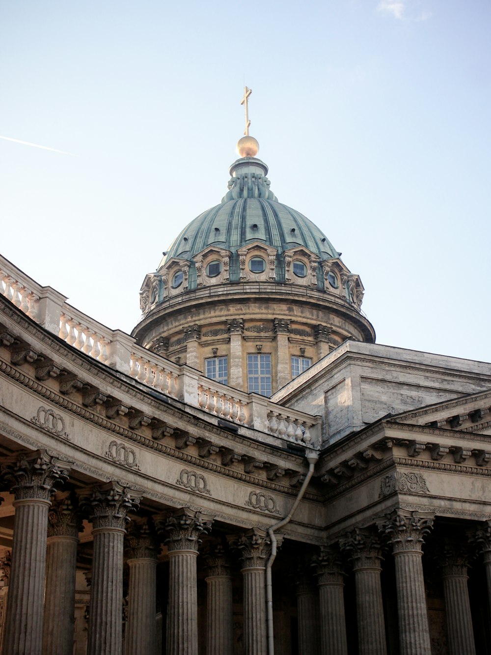 a building with columns and a dome on top