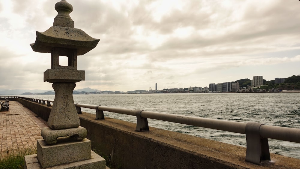 a large body of water next to a pier