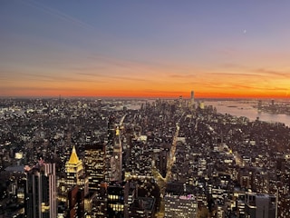 An inspiring view of a city skyline at sunset.