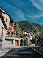 a street with a mountain in the background