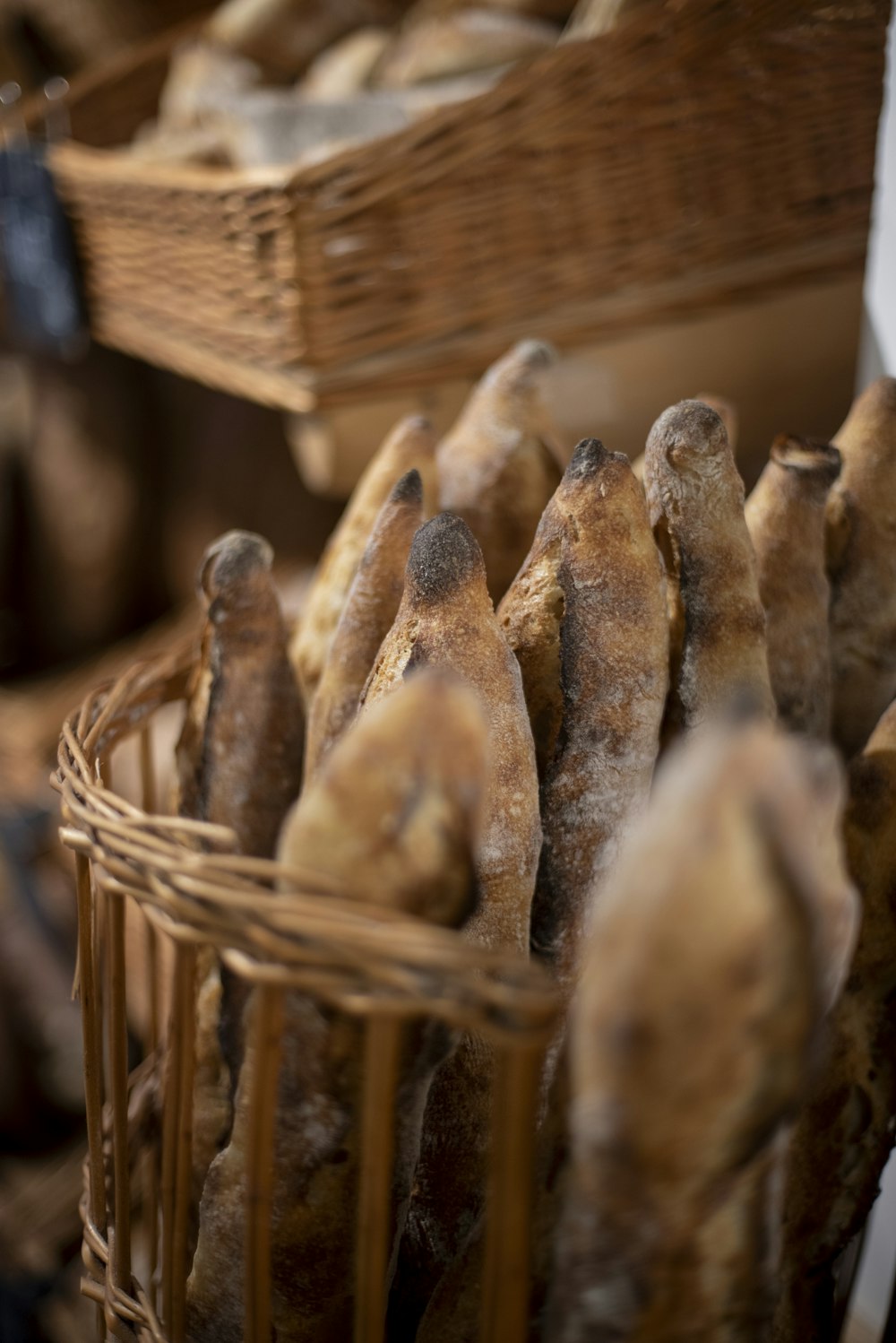 a basket filled with lots of different types of bread