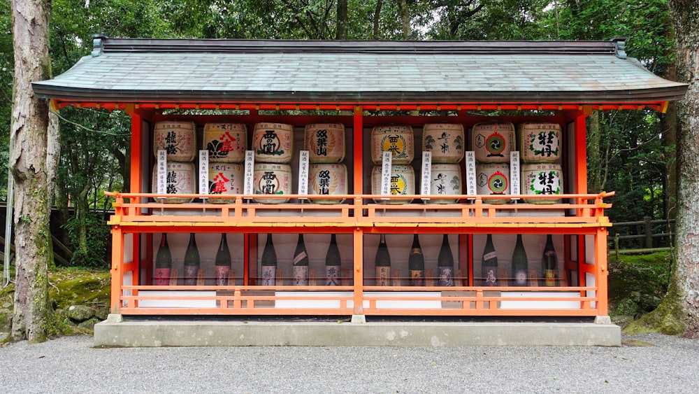 a small shrine with a lot of bottles on it