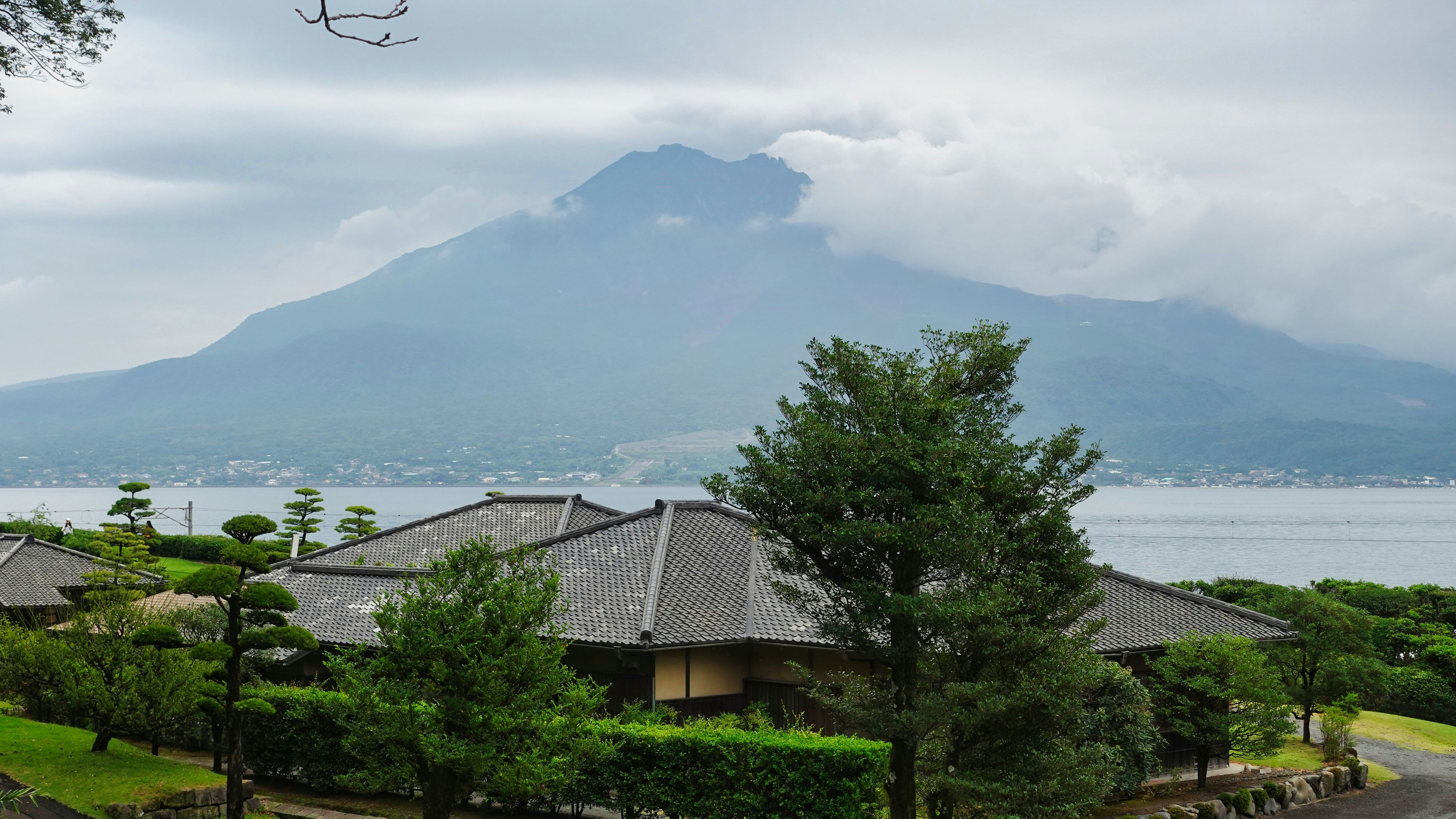 a house with a mountain in the background