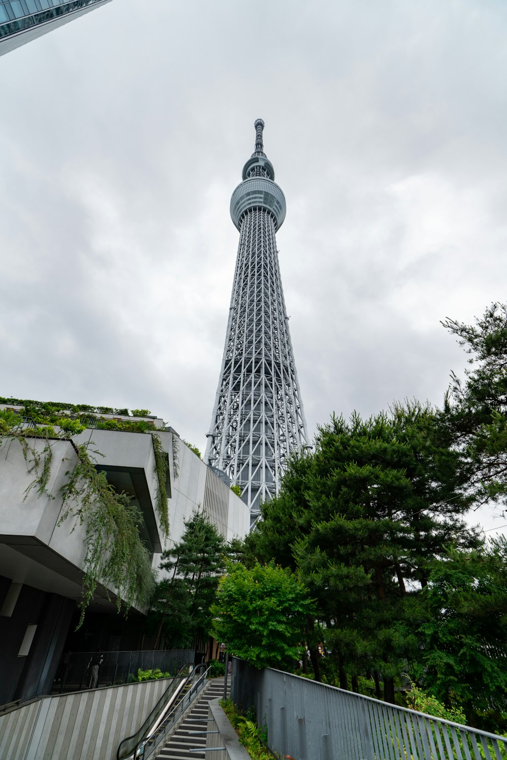 a very tall tower towering over a city