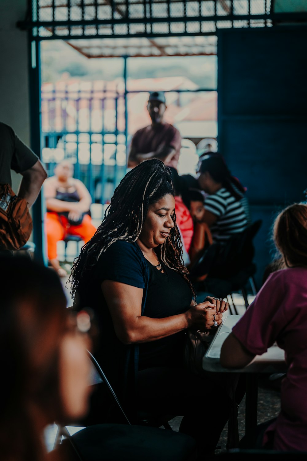 a group of people sitting around a table