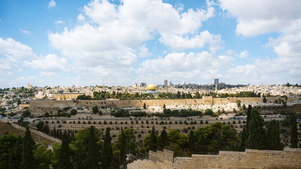 a view of a city from a hill