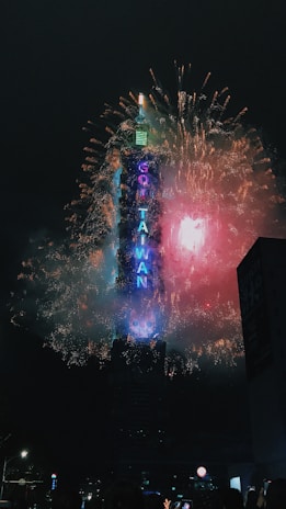 A colorful travel-themed image showing landmarks from Taiwan and Mexico side by side.