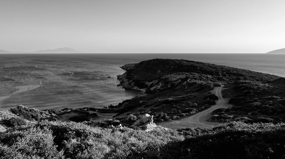 a black and white photo of the ocean